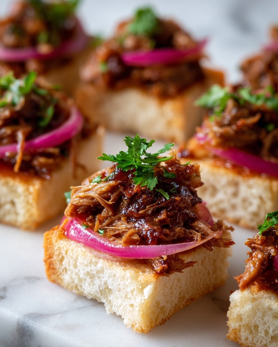 The image shows close-up pieces of bread topped with a layered mix of shredded meat that is richly colored in brown and orange shades, set on a white marbled surface. Each piece has a base layer of soft, light beige bread, followed by a thin layer of pickled red onions with pink and translucent tones that add a slight shine. On top of that is a pile of shredded meat mixed with spices, giving it a textured and slightly crispy look with dark caramelized spots. In the background, there is a sprig of green parsley visible for a touch of color. Photo taken with an iphone --ar 4:5 --v 7