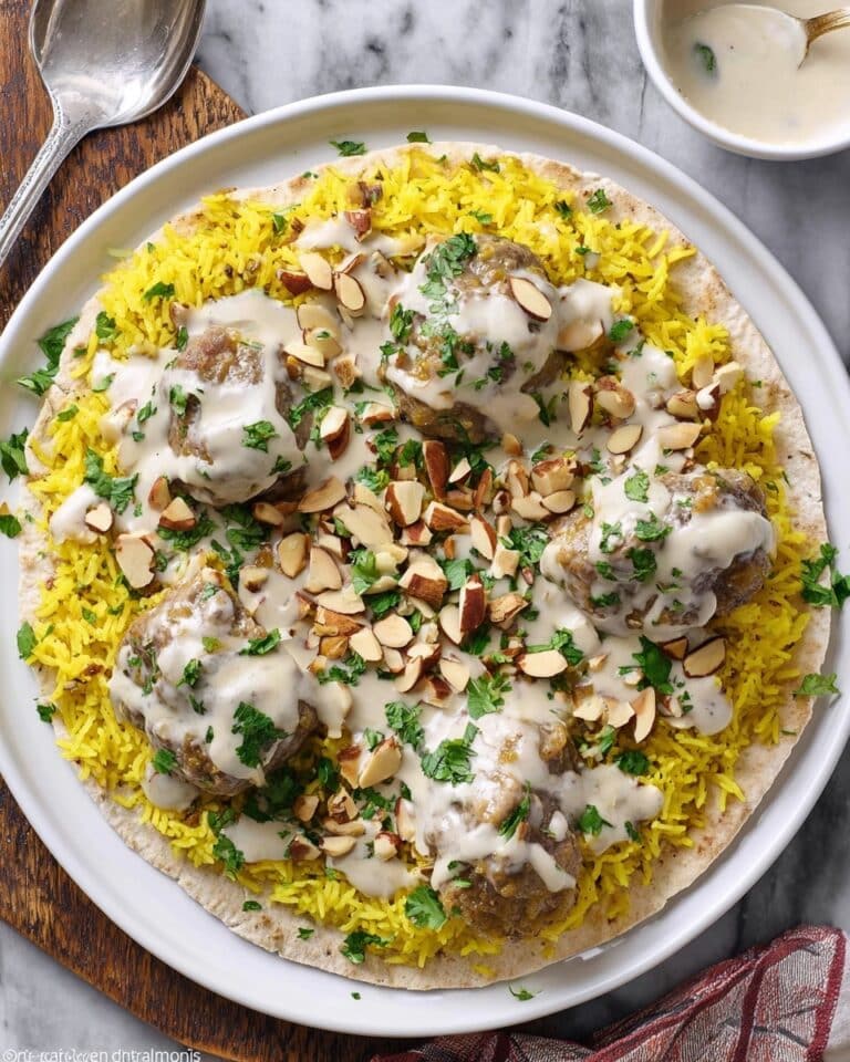 Mansaf: Traditional Jordanian Lamb with Jameed Sauce and Aromatic Rice Recipe