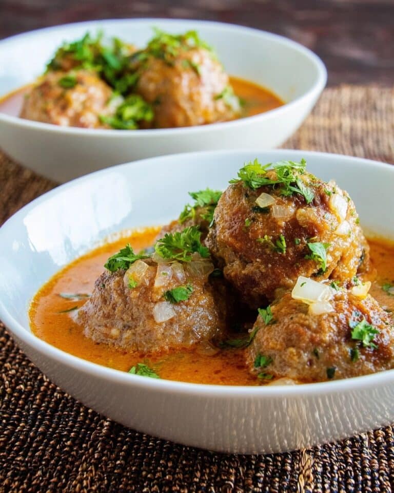Kanda: Pumpkin Seed and Beef Meatball Stew with Tomato-Chili Sauce Recipe
